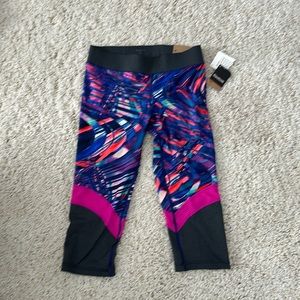Reebok Girls multicolor compression tights. Size XL